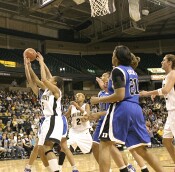 ...but kept the possession alive with an offensive rebound, dishing shortly after to Harding for a Duke second chance hoop.