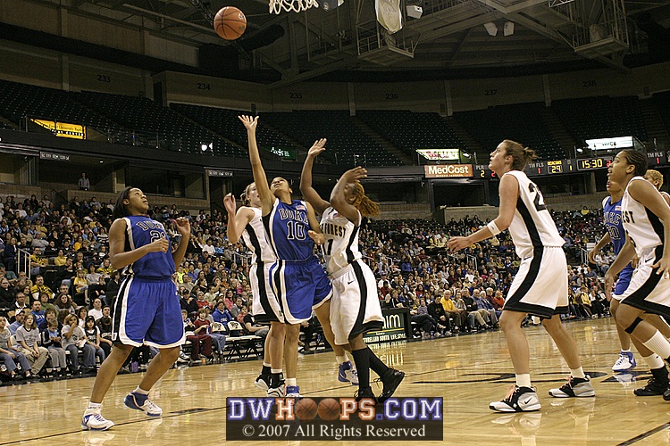 On the next possession, Lindsey attacks the basket again...