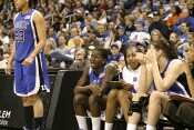 Bridgette Mitchell exhorts her teammates, as Steve Barnes calls the game for Inside Access, and Chante Black records stats.