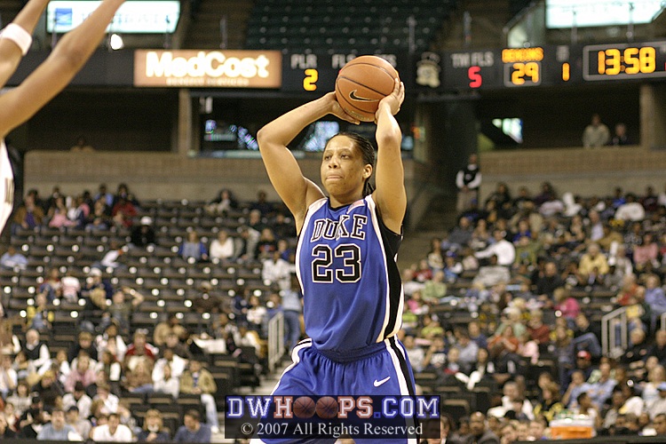 Wanisha Smith sees Bridgette Mitchell, who would put the ball in the basket so quickly that I was out of focus.  (Sorry!)