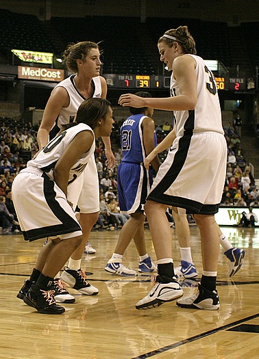...and Tiffany Roulhac got there late, committing her 5th foul.