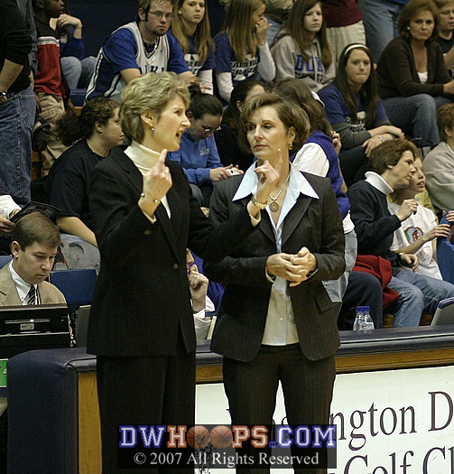 BC Head Coach Cathy Inglese and Coach G discuss the fine points before the ballgame