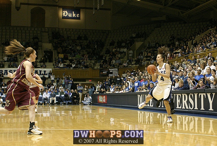 Abby takes the long pass on the break...