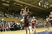 20-8, 14:36 - Wanisha Smith drives on Kindyll Dorsey for the hoop...