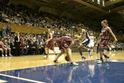 26-12, 11:30 - Elisabeth Egnell turns over Lindsey Harding in the lane during a somewhat sloppy stretch by both teams.