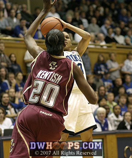 Kaydia Kentish tries to recover on defense as Lindsey Harding takes a jumper