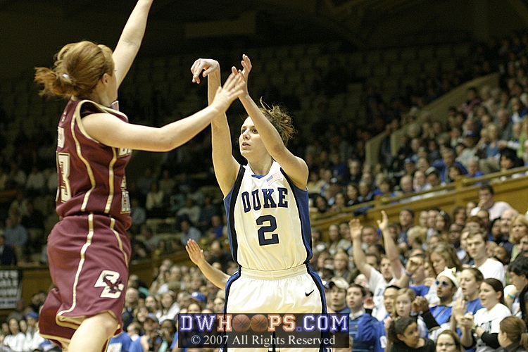 Emily Waner attempts a 3 over Mickel Picco