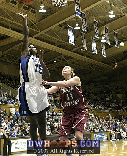 Mitchell gets around Ress for the layup