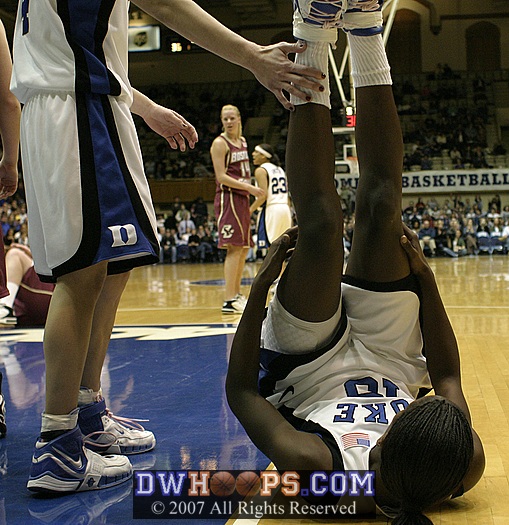 ...who is whistled for a foul while the shot is in the air, and falls to the ground.