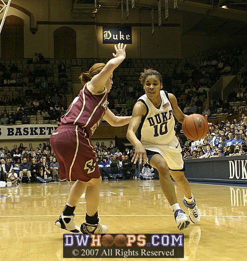 Lindsey Harding drives...