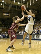 46-25, 1:15 - Abby Waner, closely guarded by Sarah Marshall, pulls in a pass