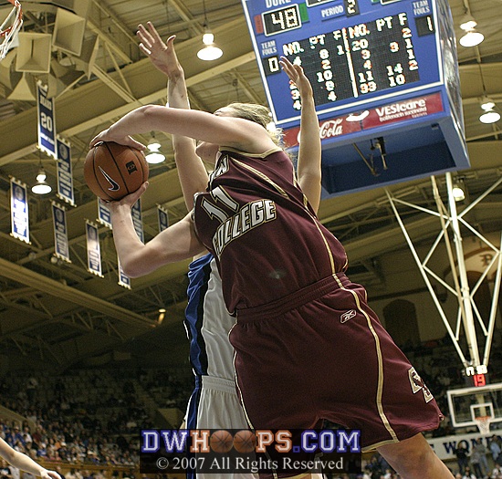 Kathrin Ress twists to the basket for a layup try