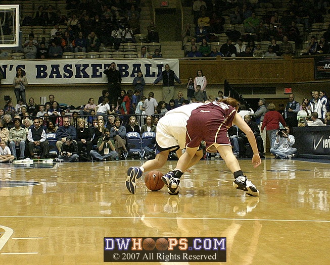 Trying for a steal, Abby Waner fouls Mickel Picco