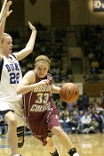 58-34, 11:35 - Mickel Picco drives against Brittany Mitch...