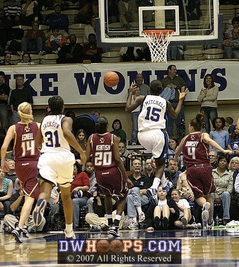 Bridgette Mitchell's layup blocked by Kindyll Dorsey