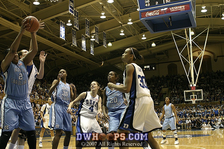 Erlana Larkins pulls down the ball after Abby Waner was whistled for a foul