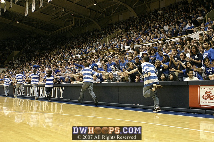 Band members rush onto the floor for Wipe Out