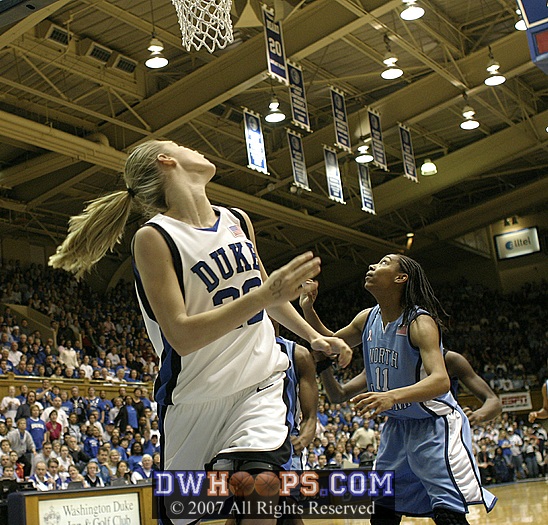 Brittany Mitch watches her fast break layup fall, keyed by a steal and perfect pass by Harding