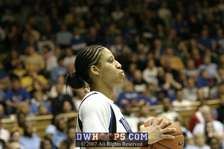 Nish works the inbound pass and her trademark chewing gum