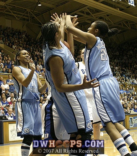 Iman McFarland fouls Joy Cheek.  UNC leads the ACC in compound names.