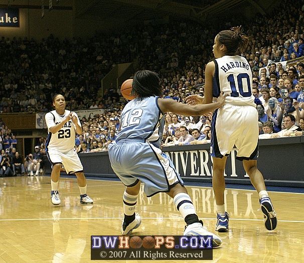Latta's defense forces Lindsey to give it up.  The Heels played Harding tough the last part of the first half.