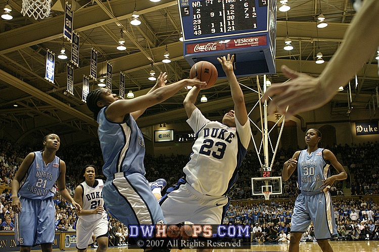 Erlana Larkins blocks Wanisha Smith