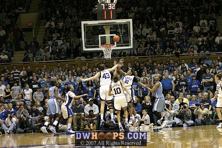The mere presence of Alison Bales causes Larkins to miss on a key possession