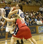 Alison Bales works inside against NU's Joanna Ausmann