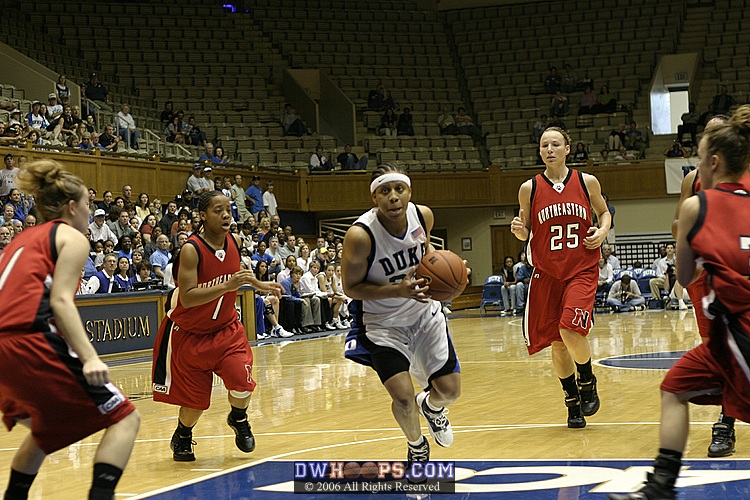 Wanisha Smith sees an open lane to the basket, and drives...