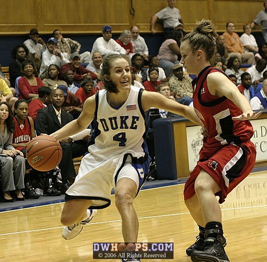 Abby Waner works to gain separation from Northeastern senior guard Jody Burrows