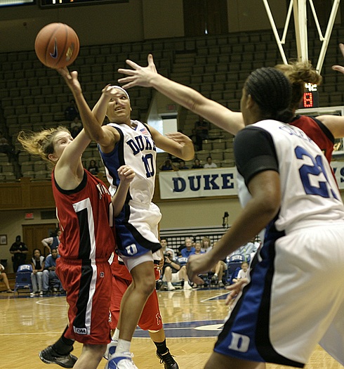 Lindsey Harding elevates for the shot and is fouled by Ashlee Feldman