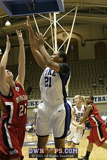Joy Cheek in the lane, shooting over Holly Guastalli