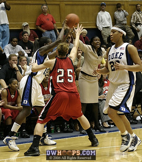 Northeastern head coach Daynia La-Force Mann screams for defense as Bridgette Mitchell is closely guarded by Stefanie Hodell (25)