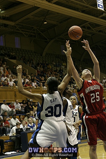 Stefanie Hodell (25) and Carrem Gay compete for the rebound