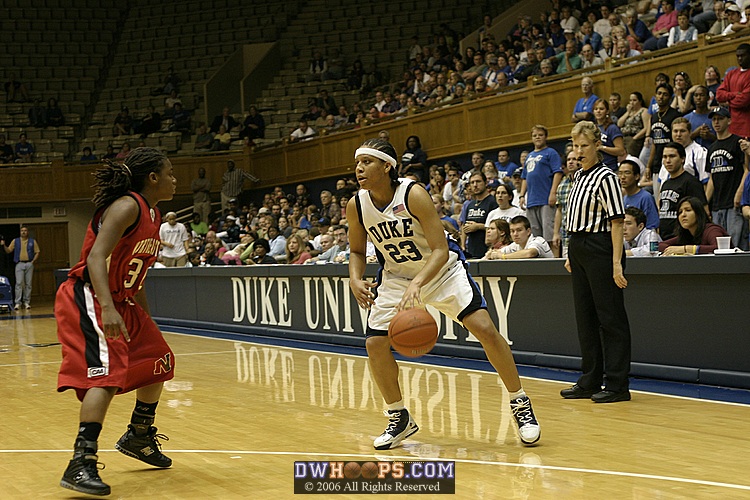 Wanisha Smith looks to drive on Kateema McLean