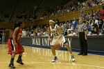 Wanisha Smith looks to drive on Kateema McLean