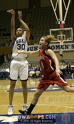 NU's Shaleyse Smallwood (1) is too late to stop a Carrem Gay jumper