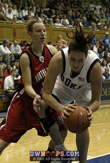 Alison Bales gets to a loose ball just in front of Stefanie Hodell...