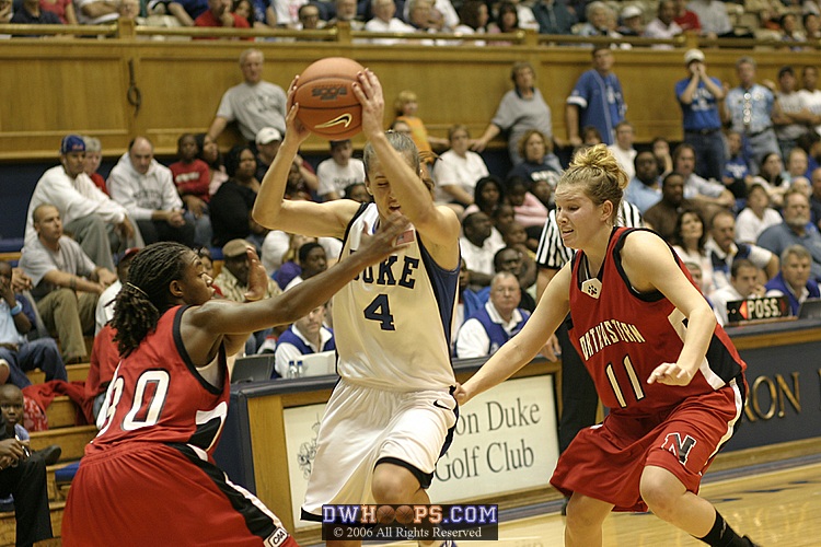 Abby Waner in traffic, guarded by Kateema McLean (30) and Ashlee Feldman