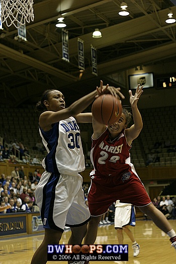 Carrem Gay battles for the loose ball