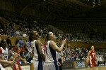 Carrem Gay and Abby Waner watch for the rebound