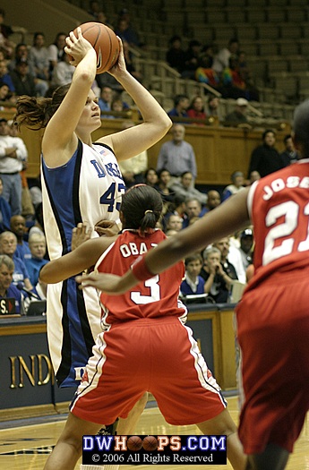 Alison Bales looks for the entry pass (1 of 2)