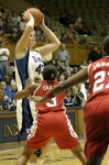 Alison Bales looks for the entry pass (1 of 2)