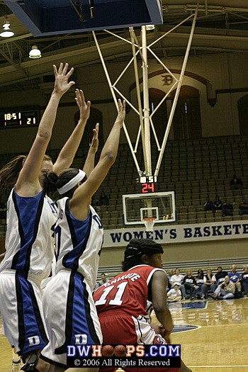Alison Bales and Linsdey Harding are ready on defense