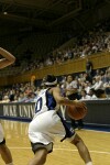 Linsdey Harding begins to push the ball downcourt after a defensive rebound