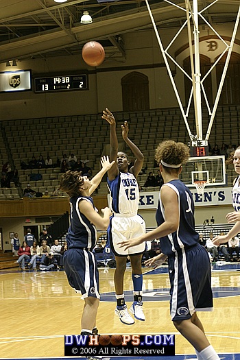 Bridgette Mitchell takes a jump shot from the top of the key
