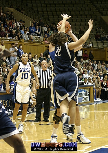 Linsdey Harding looks on as Penn State's Courtney Molinaro attempts to block an Alison Bales shot...