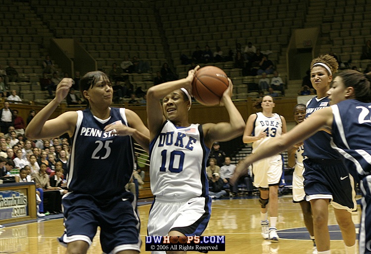 Linsdey Harding guarded by Kamela Gissendanner (left)