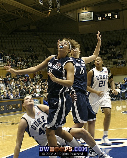 ...and crashes to the floor as Penn State's Charity Renfro looks for a possible rebound