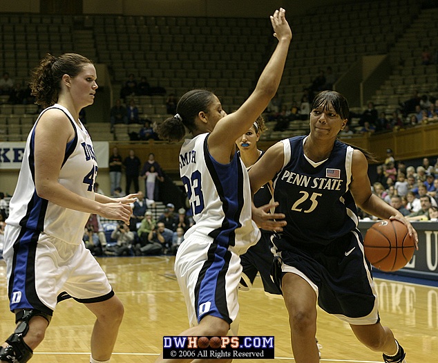 Penn State's Kamela Gissendanner drives against Wanisha Smith, as Alison Bales looks on